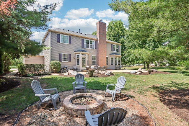 1271 Mcdole Dr, Sugar Grove, IL 60554 - rear view of house featuring an outdoor fire pit, a patio, a chimney, and a yard