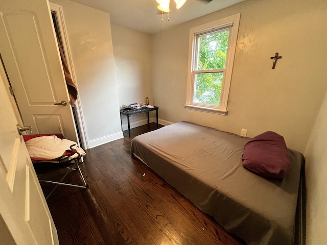 3321 W 71st St, Chicago, IL 60629 - bedroom featuring dark wood-type flooring and baseboards