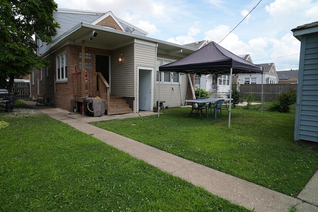 3321 W 71st St, Chicago, IL 60629 - view of front of property featuring a gazebo and brick siding