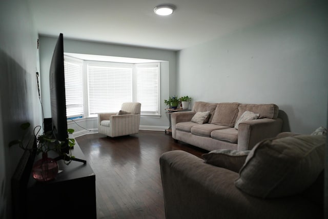 3321 W 71st St, Chicago, IL 60629 - living room with dark wood-style flooring and baseboards