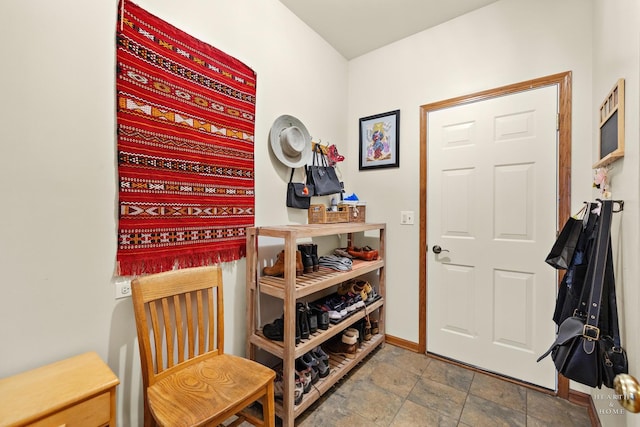 365 Oakmont Dr, Cary, IL 60013 - mudroom with baseboards and stone finish floors