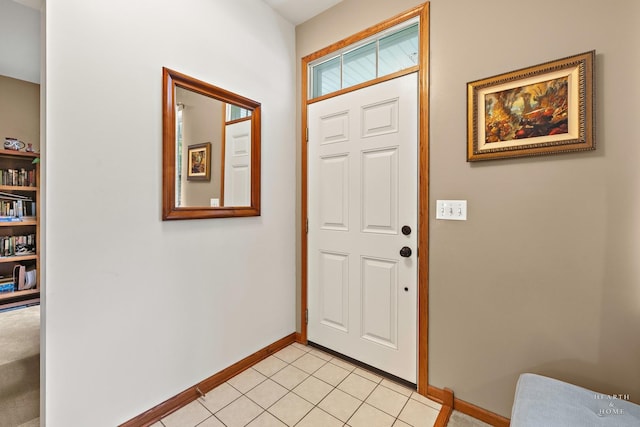 365 Oakmont Dr, Cary, IL 60013 - foyer entrance with baseboards and light tile patterned flooring