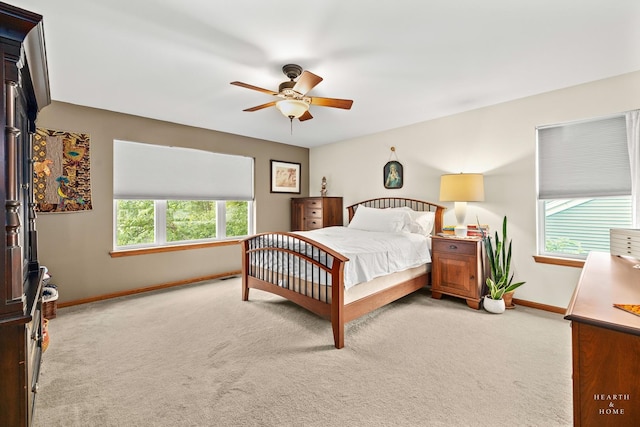 365 Oakmont Dr, Cary, IL 60013 - carpeted bedroom featuring multiple windows and a ceiling fan