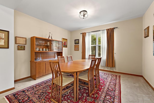 365 Oakmont Dr, Cary, IL 60013 - dining space with light colored carpet and baseboards
