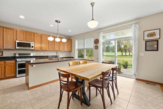 365 Oakmont Dr, Cary, IL 60013 - dining room with light tile patterned flooring and recessed lighting