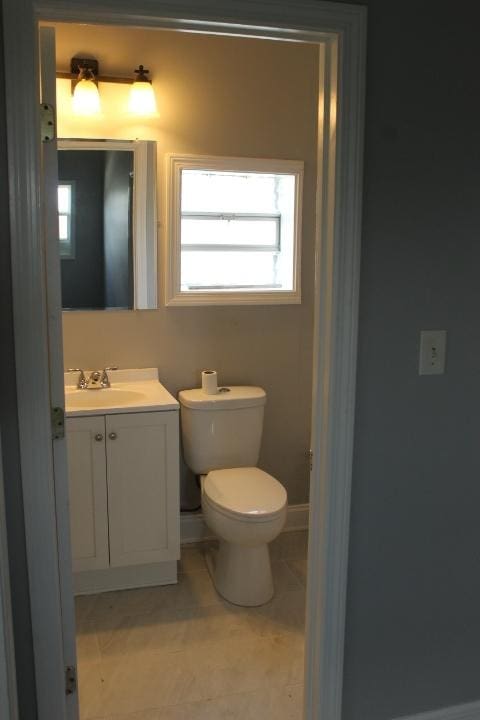 43 E 145th St, Harvey, IL 60426 - bathroom featuring vanity and tile patterned flooring