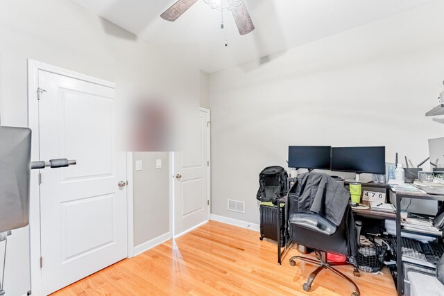2716 N Kedzie Ave Unit 2, Chicago, IL 60647 - home office with light wood-style floors and a ceiling fan