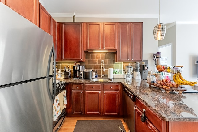 2716 N Kedzie Ave Unit 2, Chicago, IL 60647 - kitchen featuring appliances with stainless steel finishes, a peninsula, ornamental molding, decorative backsplash, and reddish brown cabinets