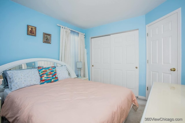2325 N Lenox Ct, Round Lake Beach, IL 60073 - carpeted bedroom featuring a closet and baseboards