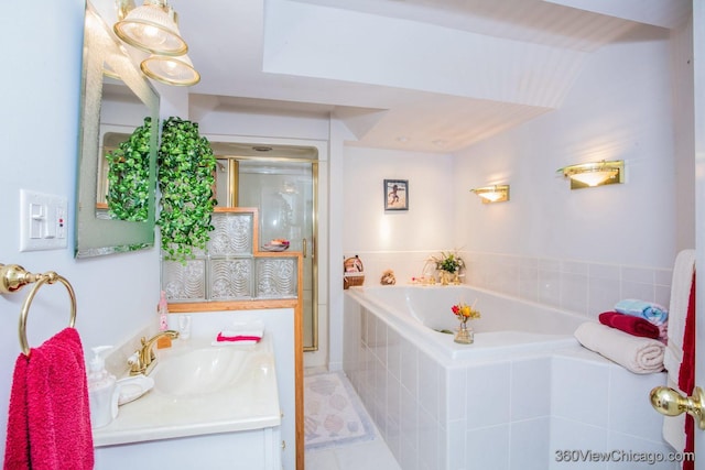 2325 N Lenox Ct, Round Lake Beach, IL 60073 - full bathroom featuring vanity, a bath, and a shower stall
