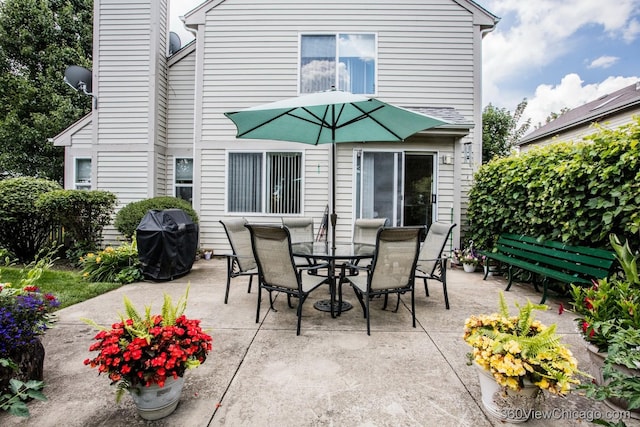 2325 N Lenox Ct, Round Lake Beach, IL 60073 - view of patio featuring a grill and outdoor dining space