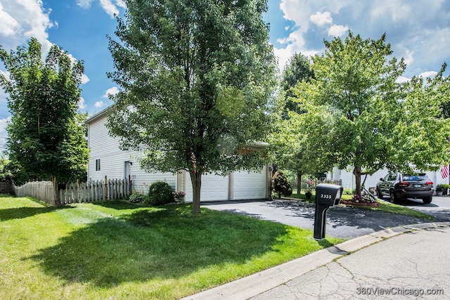 2325 N Lenox Ct, Round Lake Beach, IL 60073 - view of property hidden behind natural elements with a garage