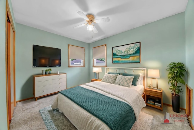 556 W River St, Bourbonnais, IL 60914 - carpeted bedroom featuring baseboards and ceiling fan