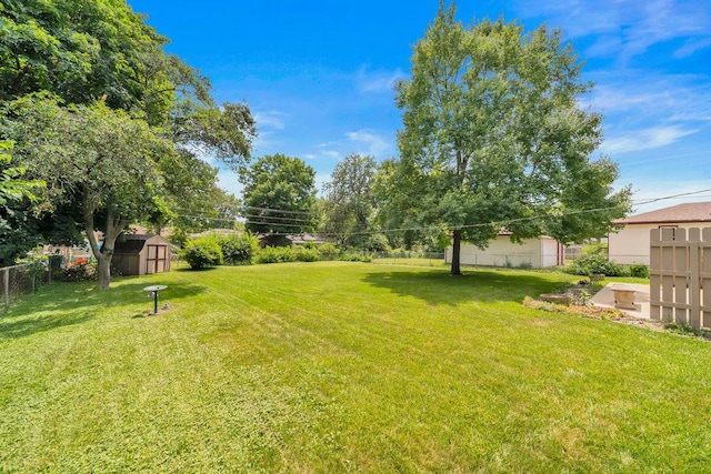 556 W River St, Bourbonnais, IL 60914 - view of yard with a storage shed