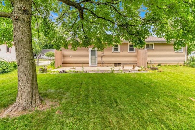 556 W River St, Bourbonnais, IL 60914 - rear view of property with a patio area