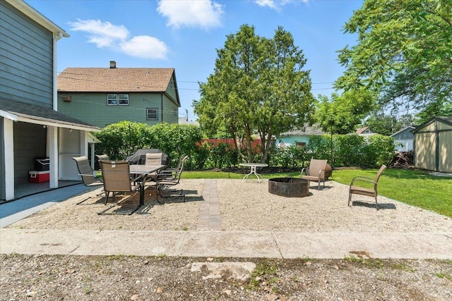 1518 Lucia Ave, Waukegan, IL 60085 - view of patio / terrace featuring a fire pit
