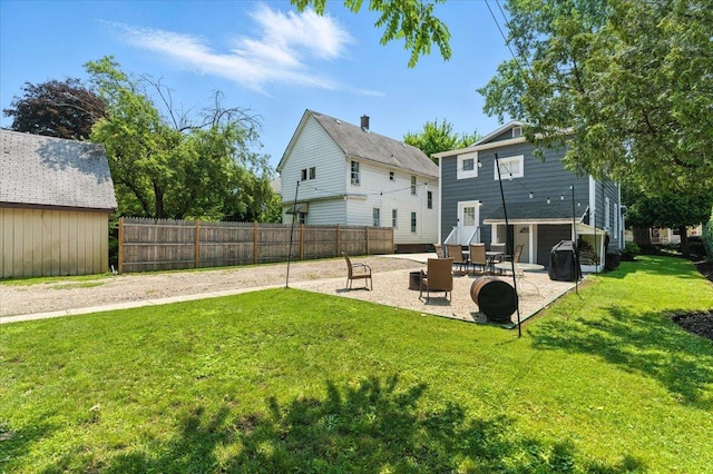 1518 Lucia Ave, Waukegan, IL 60085 - back of house featuring a patio area