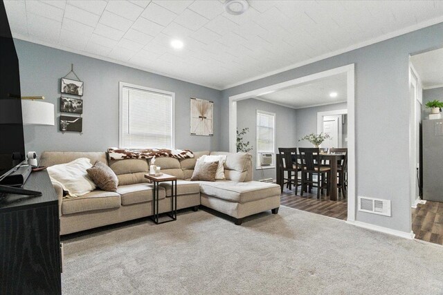 1518 Lucia Ave, Waukegan, IL 60085 - living room with crown molding, carpet flooring, and wood finished floors
