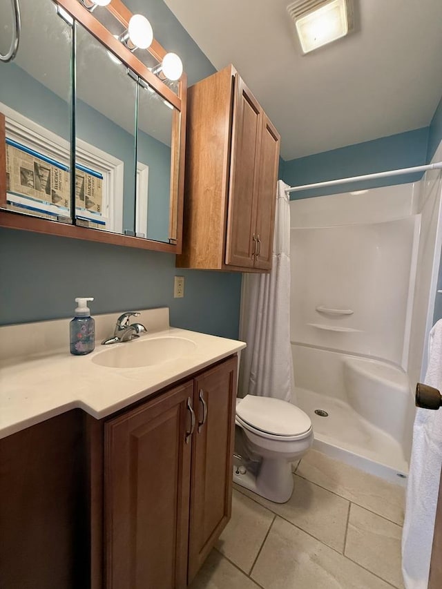 1340 Jeffrey Dr, Rantoul, IL 61866 - full bathroom featuring vanity, tile patterned flooring, and a shower with shower curtain