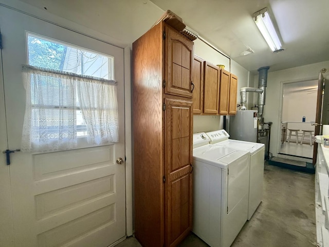 1340 Jeffrey Dr, Rantoul, IL 61866 - laundry area featuring cabinet space, washer and clothes dryer, and electric water heater