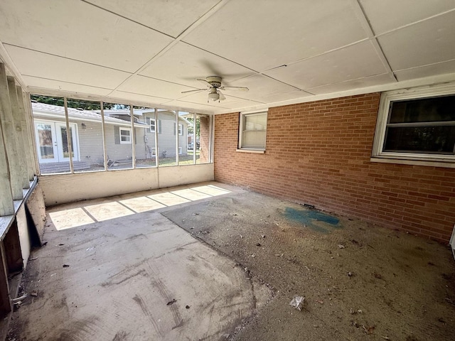 1340 Jeffrey Dr, Rantoul, IL 61866 - unfurnished sunroom featuring a ceiling fan and french doors