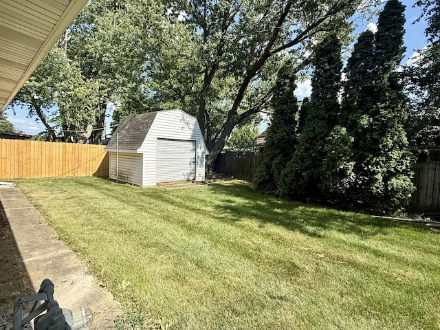 1340 Jeffrey Dr, Rantoul, IL 61866 - fenced backyard featuring a storage unit