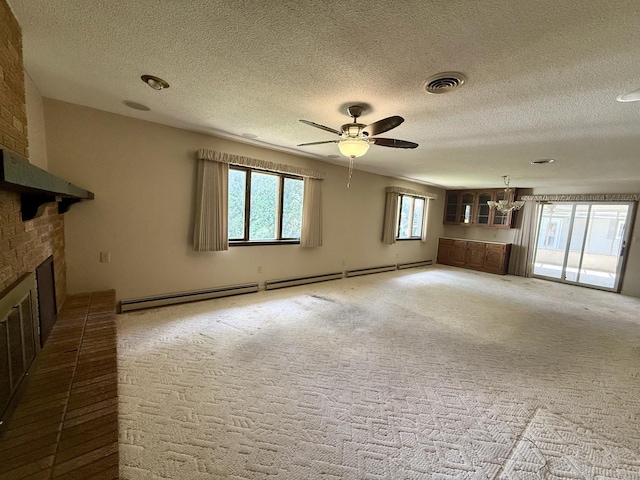 1340 Jeffrey Dr, Rantoul, IL 61866 - unfurnished living room with a fireplace, a chandelier, baseboard heating, ceiling fan, and a textured ceiling