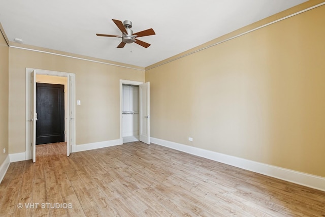 6101 N Sheridan Rd Unit 11C, Chicago, IL 60660 - unfurnished bedroom with light wood finished floors, crown molding, and a ceiling fan