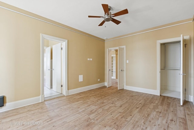6101 N Sheridan Rd Unit 11C, Chicago, IL 60660 - unfurnished bedroom with light wood finished floors, connected bathroom, a ceiling fan, and ornamental molding