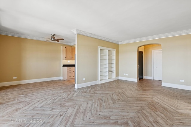 6101 N Sheridan Rd Unit 11C, Chicago, IL 60660 - spare room with arched walkways, ceiling fan, and crown molding