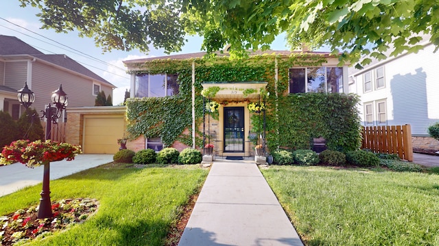 315 E Union Ave, Wheaton, IL 60187 - view of front of house with a garage, driveway, and brick siding