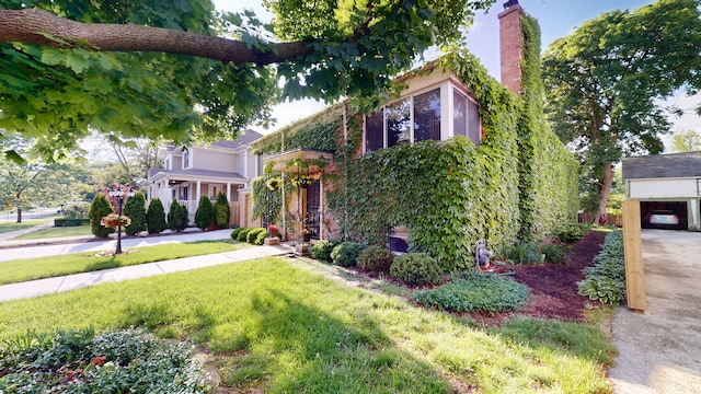 315 E Union Ave, Wheaton, IL 60187 - obstructed view of property with a front lawn and a chimney