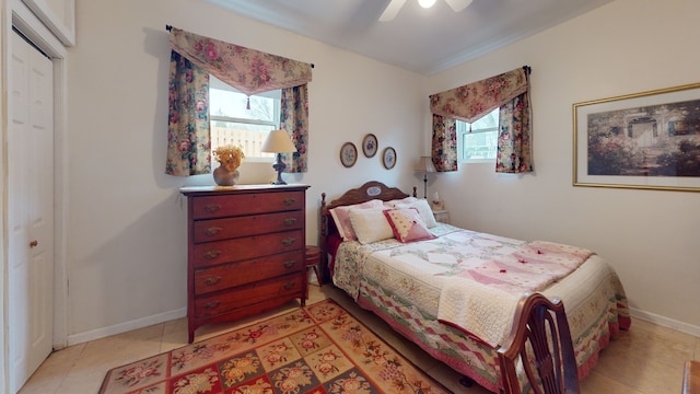 315 E Union Ave, Wheaton, IL 60187 - bedroom featuring multiple windows, light tile patterned floors, and a ceiling fan