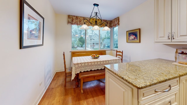 315 E Union Ave, Wheaton, IL 60187 - dining room featuring light wood-style floors and baseboards