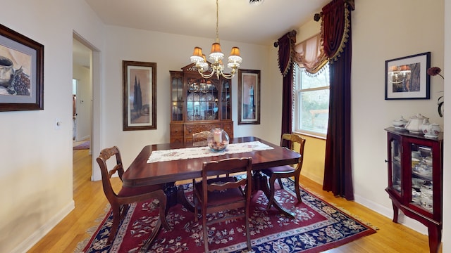 315 E Union Ave, Wheaton, IL 60187 - dining space with a chandelier and light wood finished floors
