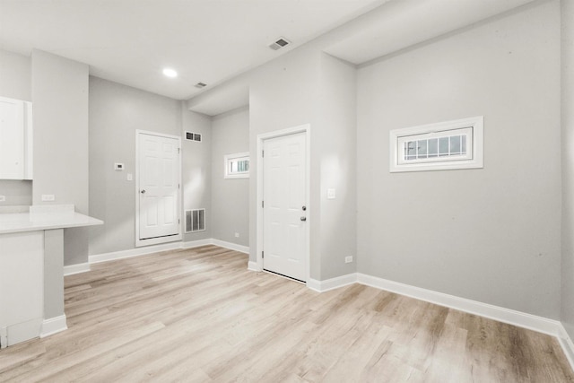 5401 W 22nd Pl, Cicero, IL 60804 - unfurnished living room featuring light wood finished floors and recessed lighting