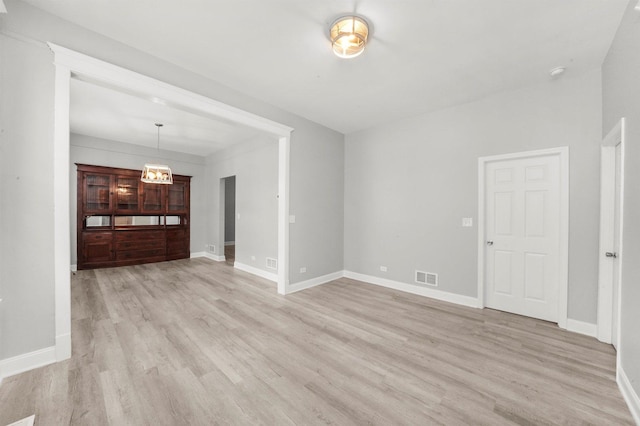 5401 W 22nd Pl, Cicero, IL 60804 - unfurnished living room featuring light wood-type flooring and baseboards