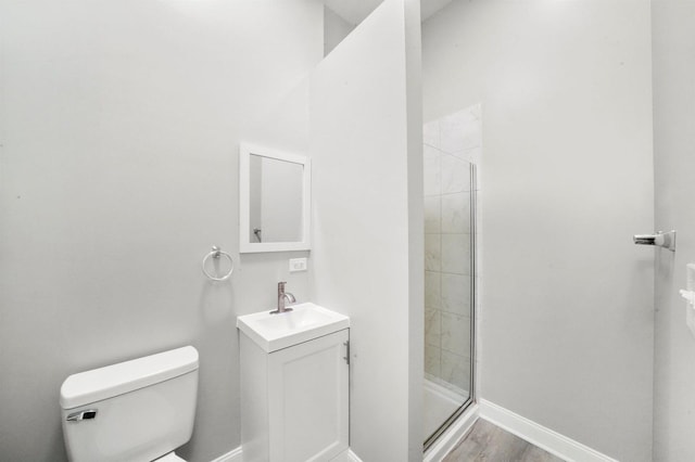 5401 W 22nd Pl, Cicero, IL 60804 - bathroom featuring a stall shower, vanity, and wood finished floors