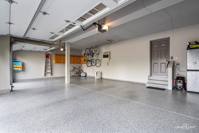 210 Fox Chase Dr N, Oswego, IL 60543 - garage featuring a garage door opener and heating unit