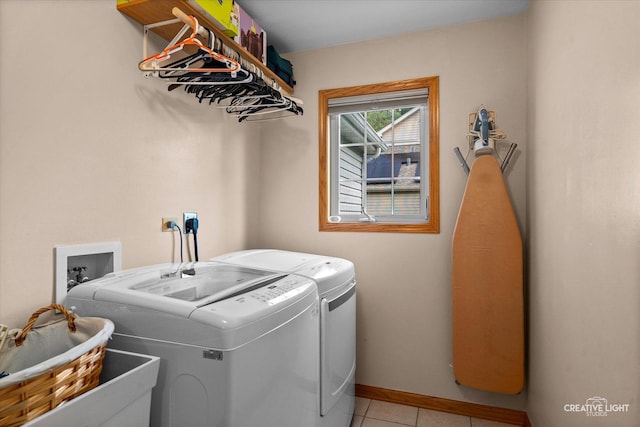 210 Fox Chase Dr N, Oswego, IL 60543 - washroom featuring separate washer and dryer and light tile patterned floors