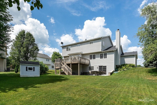 210 Fox Chase Dr N, Oswego, IL 60543 - back of house featuring a wooden deck, stairs, a shed, a lawn, and a chimney