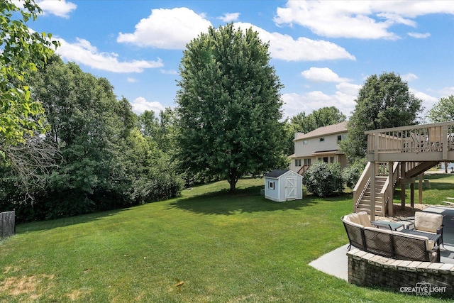 210 Fox Chase Dr N, Oswego, IL 60543 - view of grassy yard featuring stairs, a shed, a deck, an outdoor living space, and a patio