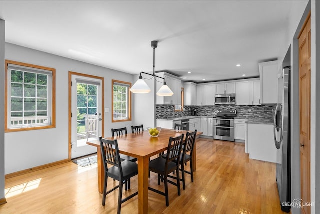 210 Fox Chase Dr N, Oswego, IL 60543 - dining area featuring light wood finished floors and recessed lighting