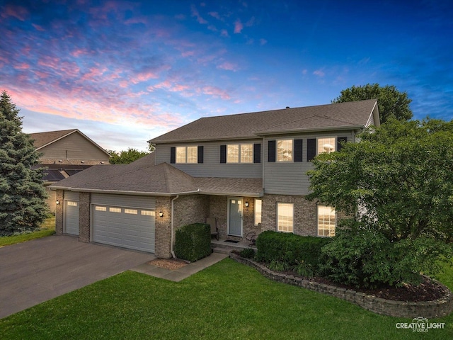 210 Fox Chase Dr N, Oswego, IL 60543 - traditional-style home featuring a garage, driveway, a yard, brick siding, and a shingled roof