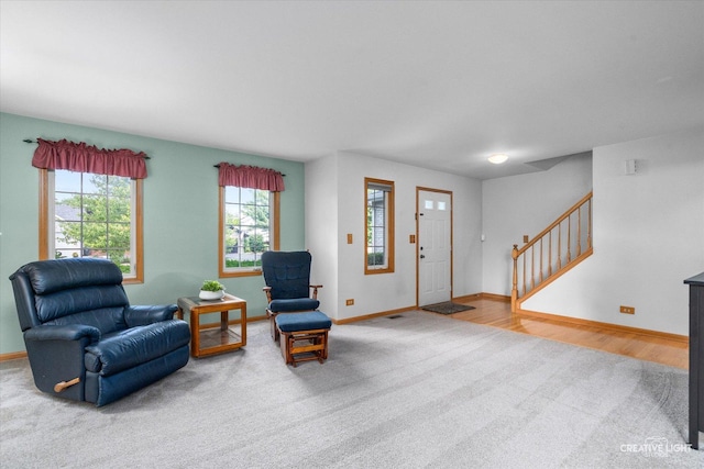 210 Fox Chase Dr N, Oswego, IL 60543 - living area with carpet flooring and stairway