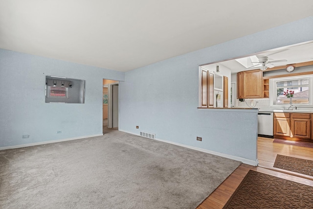 108 6th St, Downers Grove, IL 60515 - unfurnished living room with a ceiling fan and light wood-style flooring