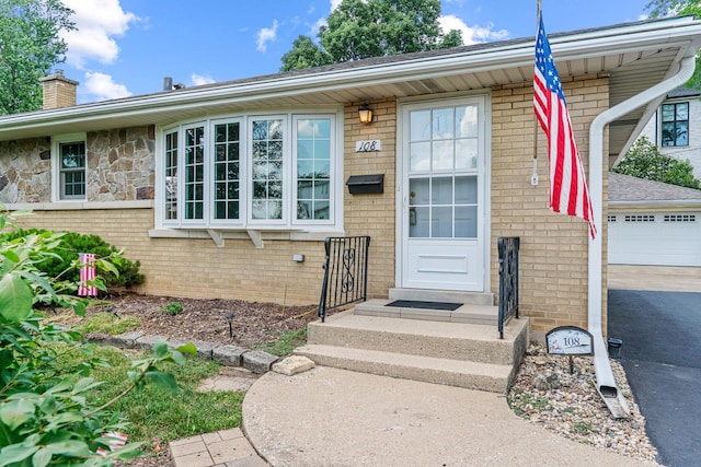 108 6th St, Downers Grove, IL 60515 - doorway to property featuring brick siding and a chimney