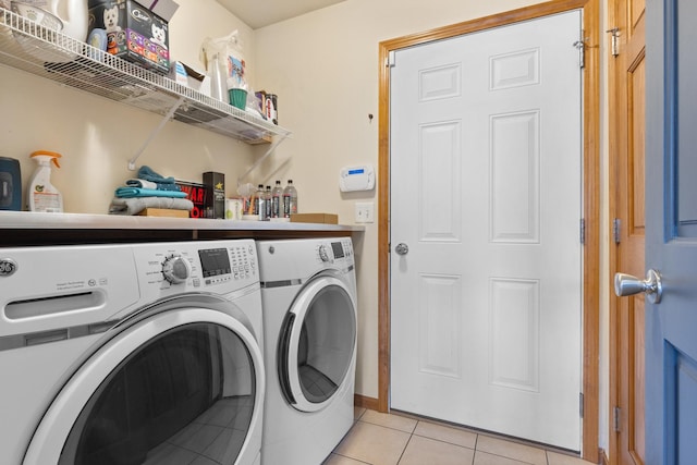 3034 Warwickshire Dr, Machesney Park, IL 61115 - washroom with washing machine and clothes dryer and light tile patterned flooring