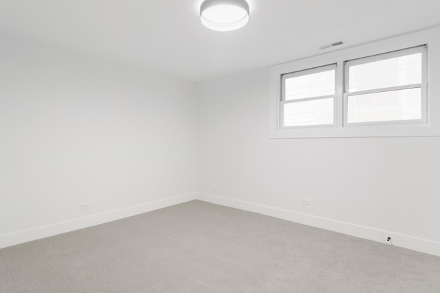 1116 W Addison St, Chicago, IL 60613 - empty room with light colored carpet and baseboards