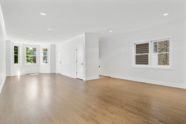 1116 W Addison St, Chicago, IL 60613 - unfurnished living room featuring wood finished floors, recessed lighting, and crown molding